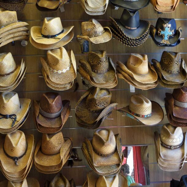 Cowboy hats on display in a store