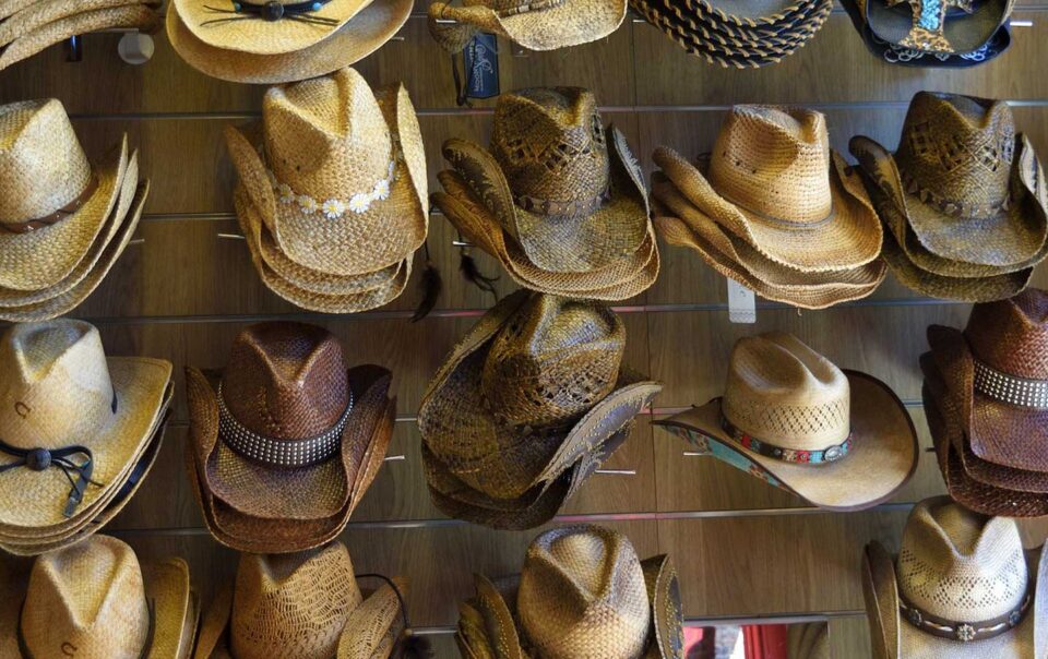 Cowboy hats on display in a store