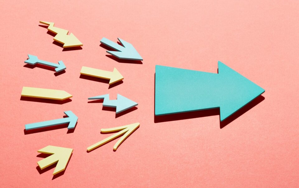 Multiple various shaped arrows decreasing in size from left to right towards one big solid arrow to show integration.